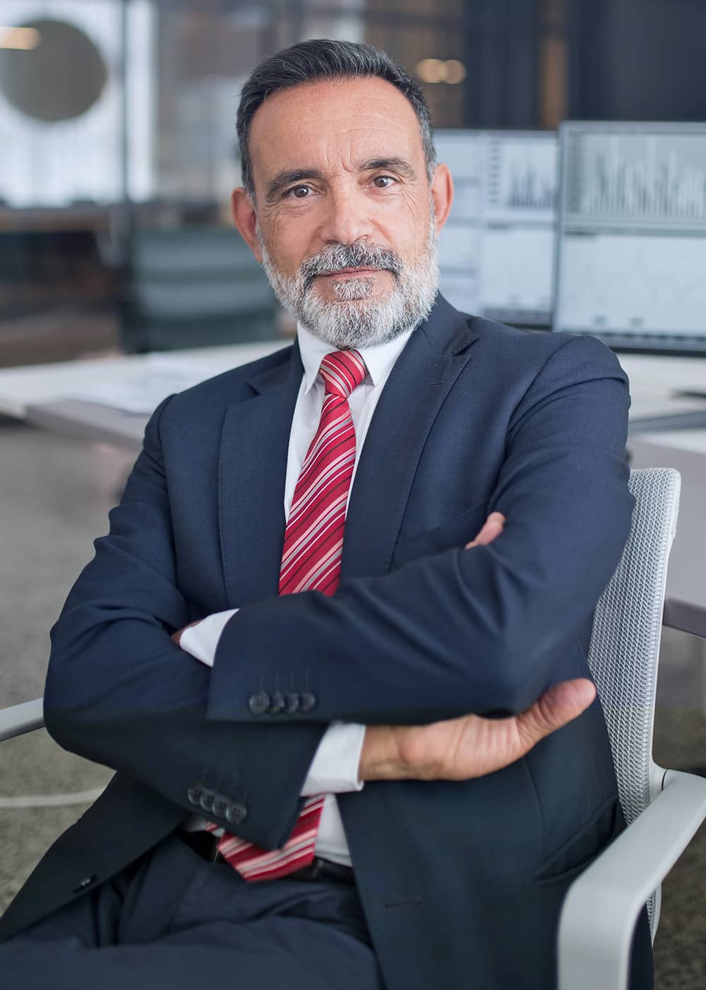 Man Sitting with His arms Crossed Man Sitting with His arms Crossed